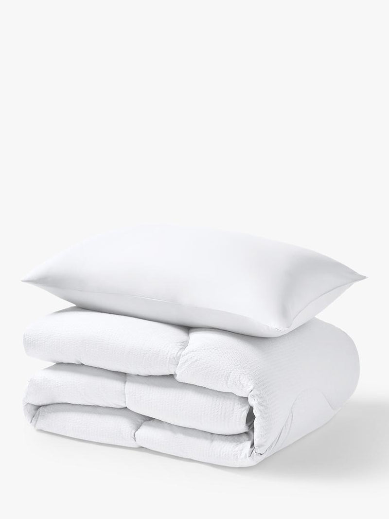 Night Lark seersucker coverless duvet and pillowcase set in polar white, imported from the UK
