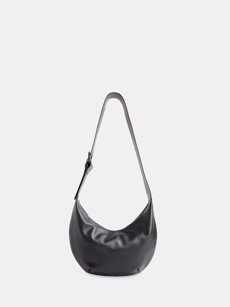 Whistles Sia curved crossbody bag in black leather (British brand)