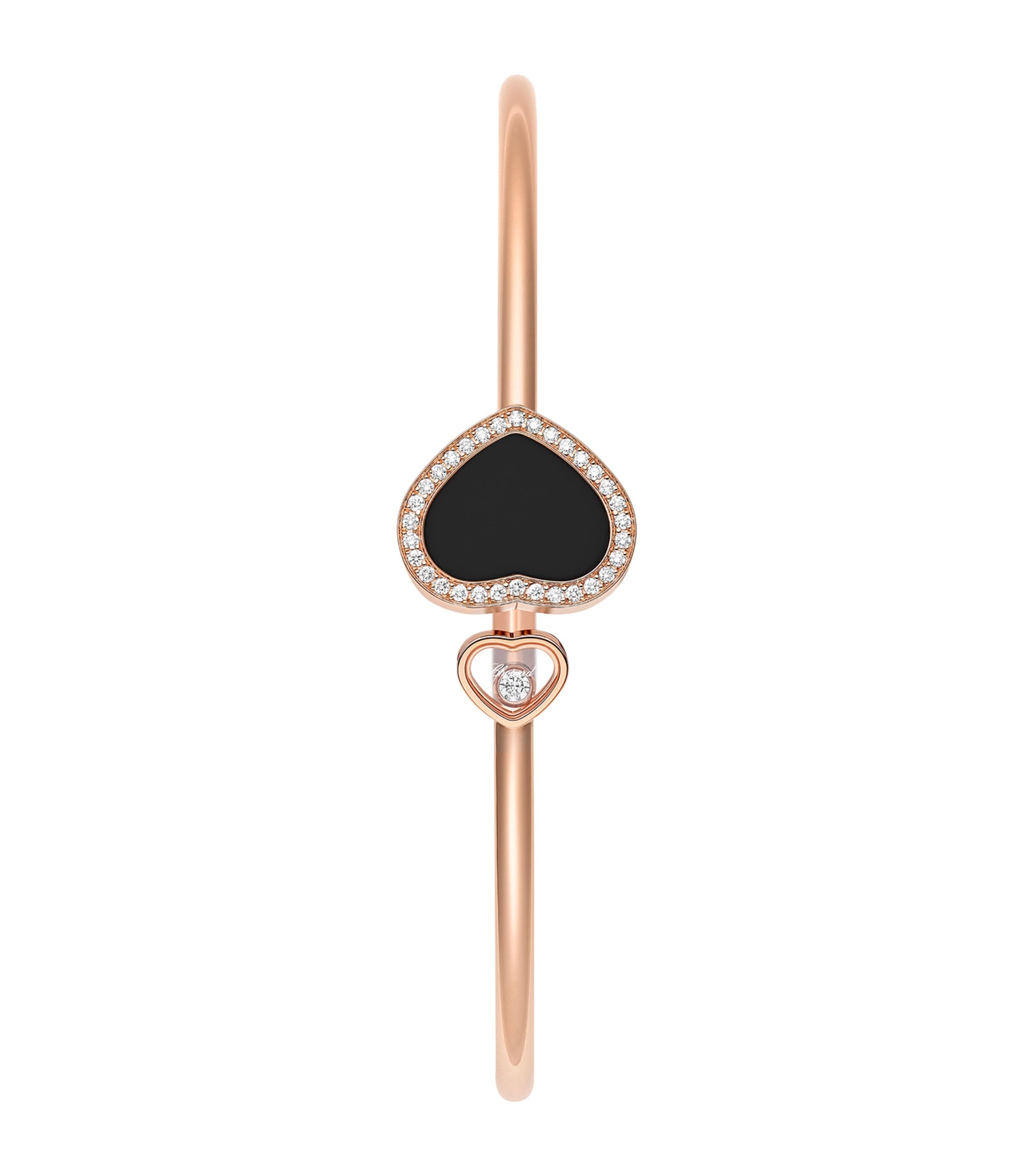 Chopard rose gold bangle with moving diamond and onyx, imported from the UK