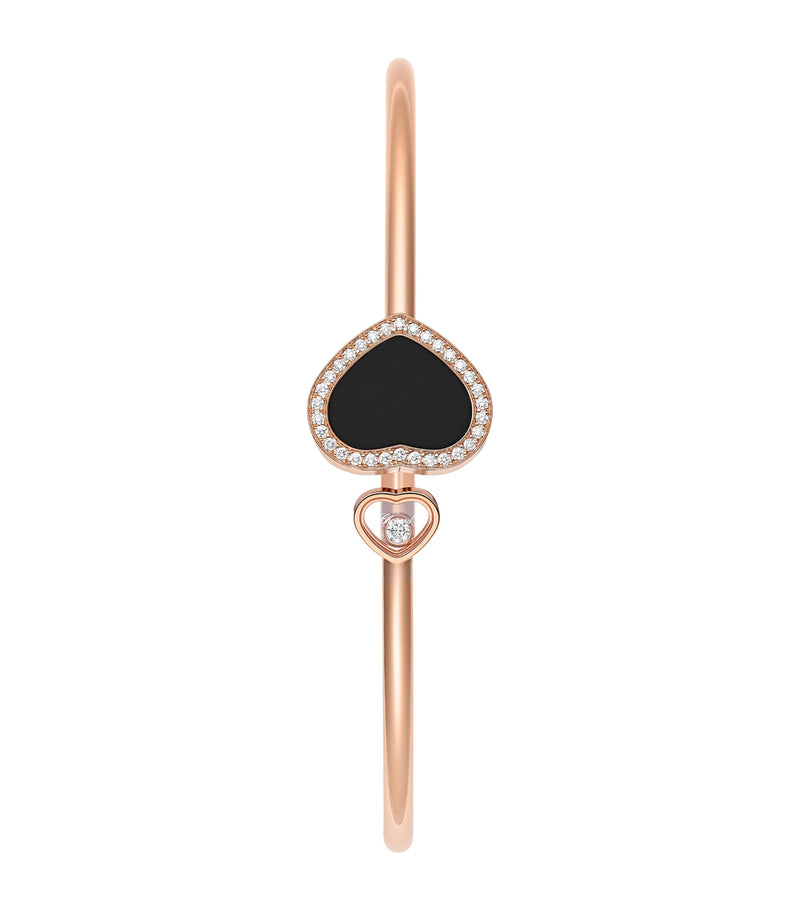 Chopard rose gold bangle with moving diamond and onyx, imported from the UK