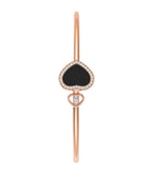 Chopard rose gold bangle with moving diamond and onyx, imported from the UK