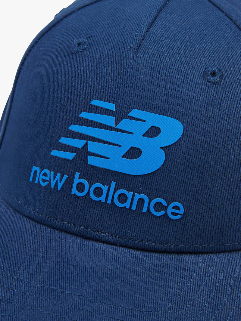 New Balance kids' stacked logo baseball cap in navy, imported from the UK