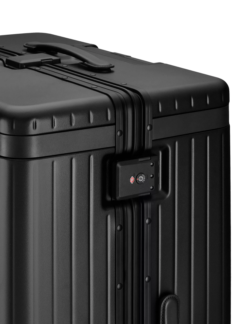 Carl Friedrik black 105L suitcase 79cm (British brand)