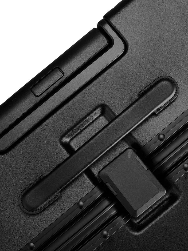 Carl Friedrik black 105L suitcase 79cm (British brand)
