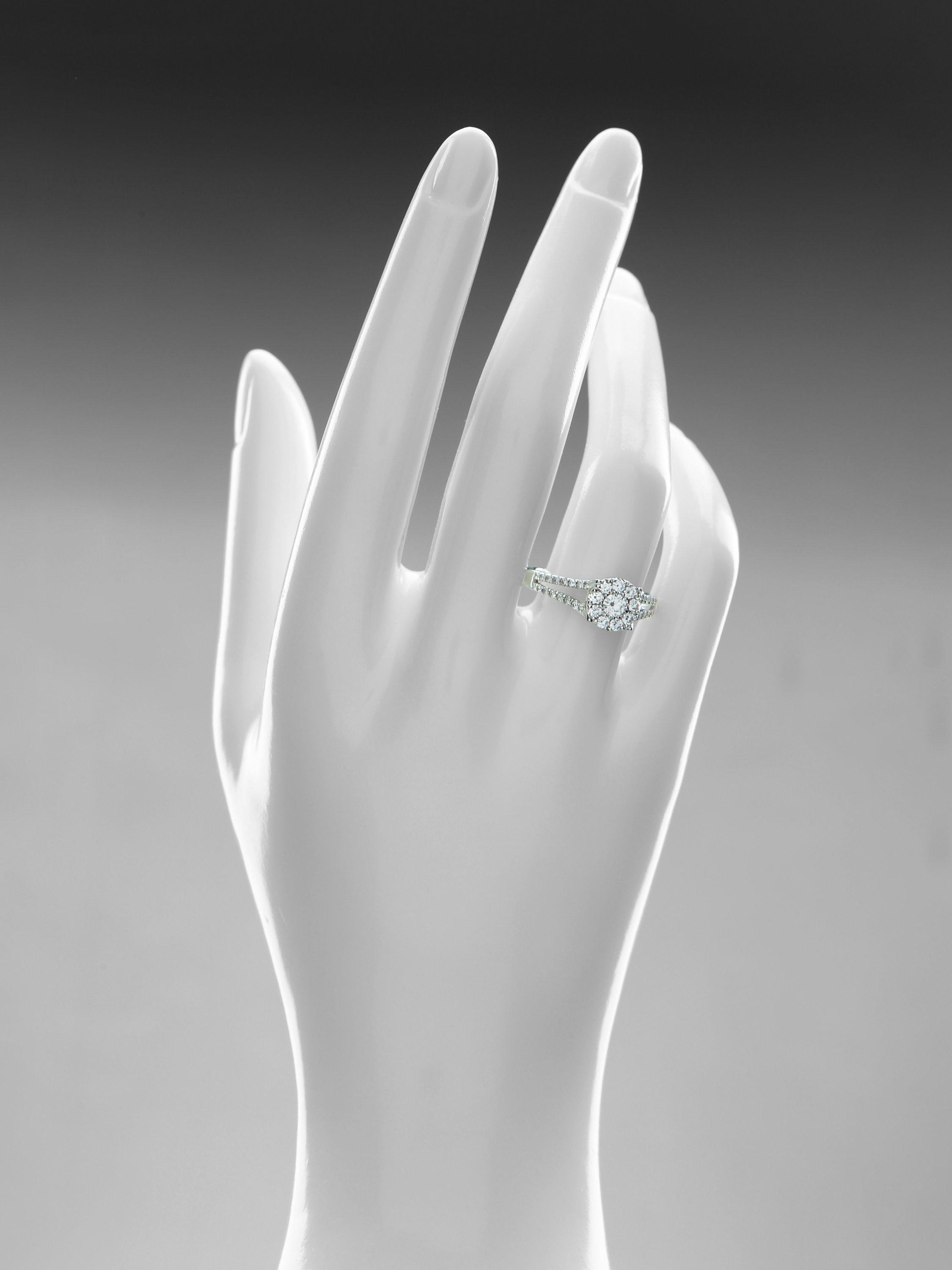 Mogul 18ct white gold halo diamond engagement ring, imported from the UK