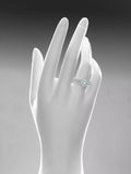 Mogul 18ct white gold halo diamond engagement ring, imported from the UK