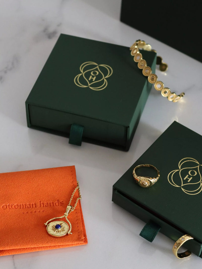 Ottoman Hands gold twist chain ring (British brand)