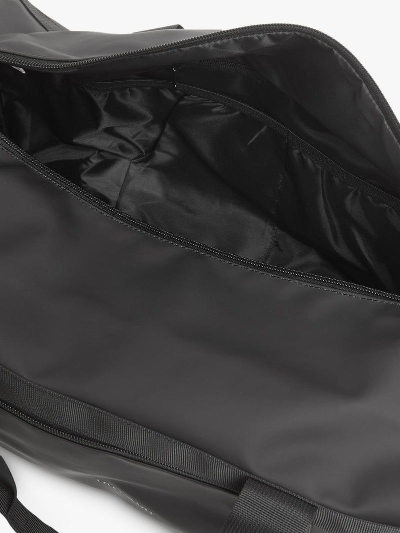 Lyle & Scott weather resistant barrel bag, imported from the UK
