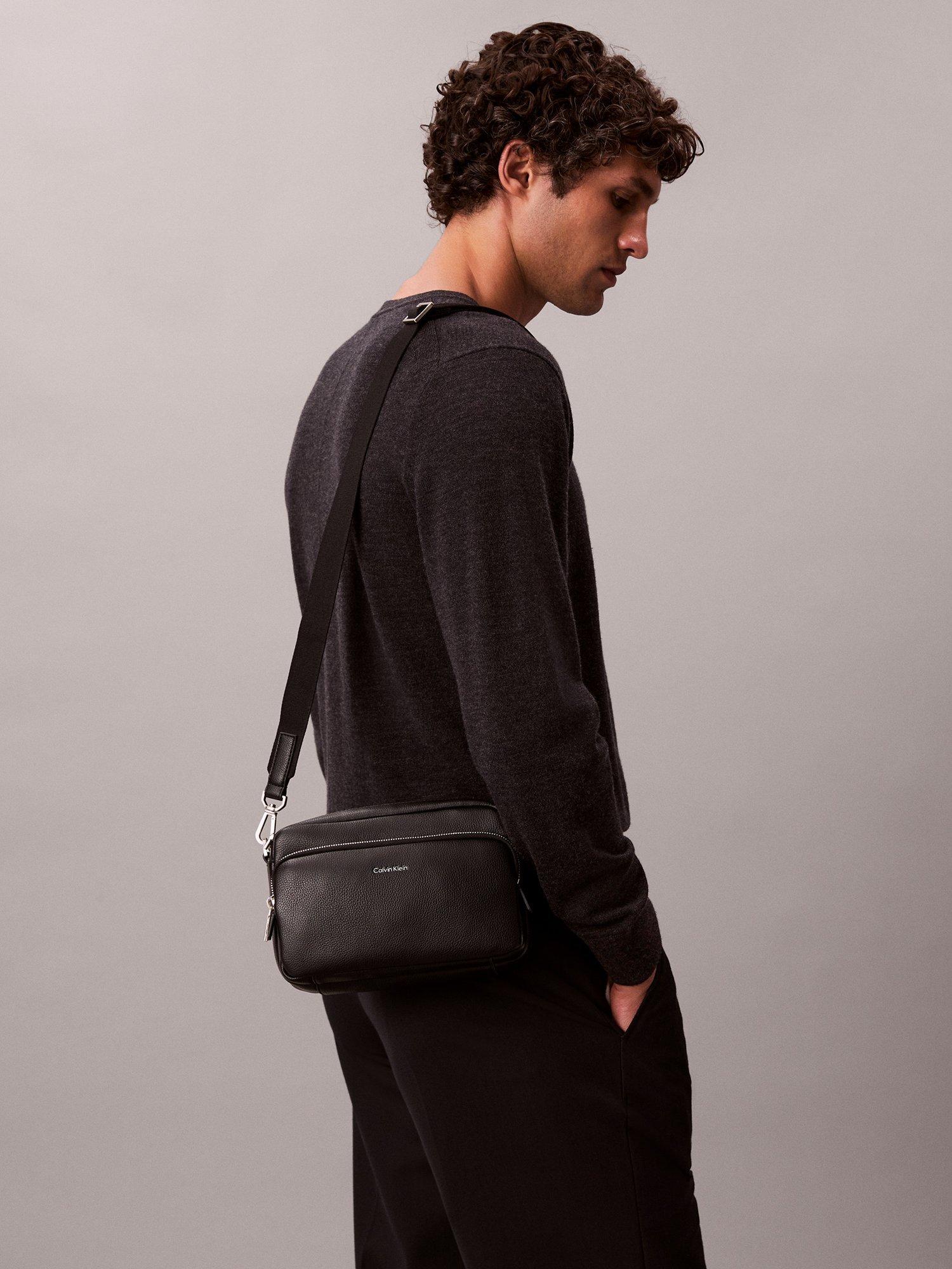 Calvin Klein black camera bag, imported from the UK