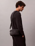 Calvin Klein black camera bag, imported from the UK