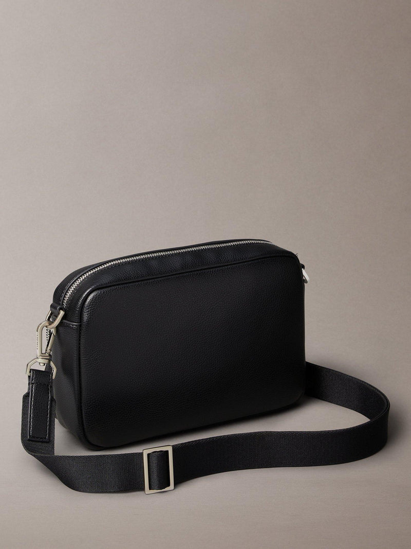 Calvin Klein black camera bag, imported from the UK