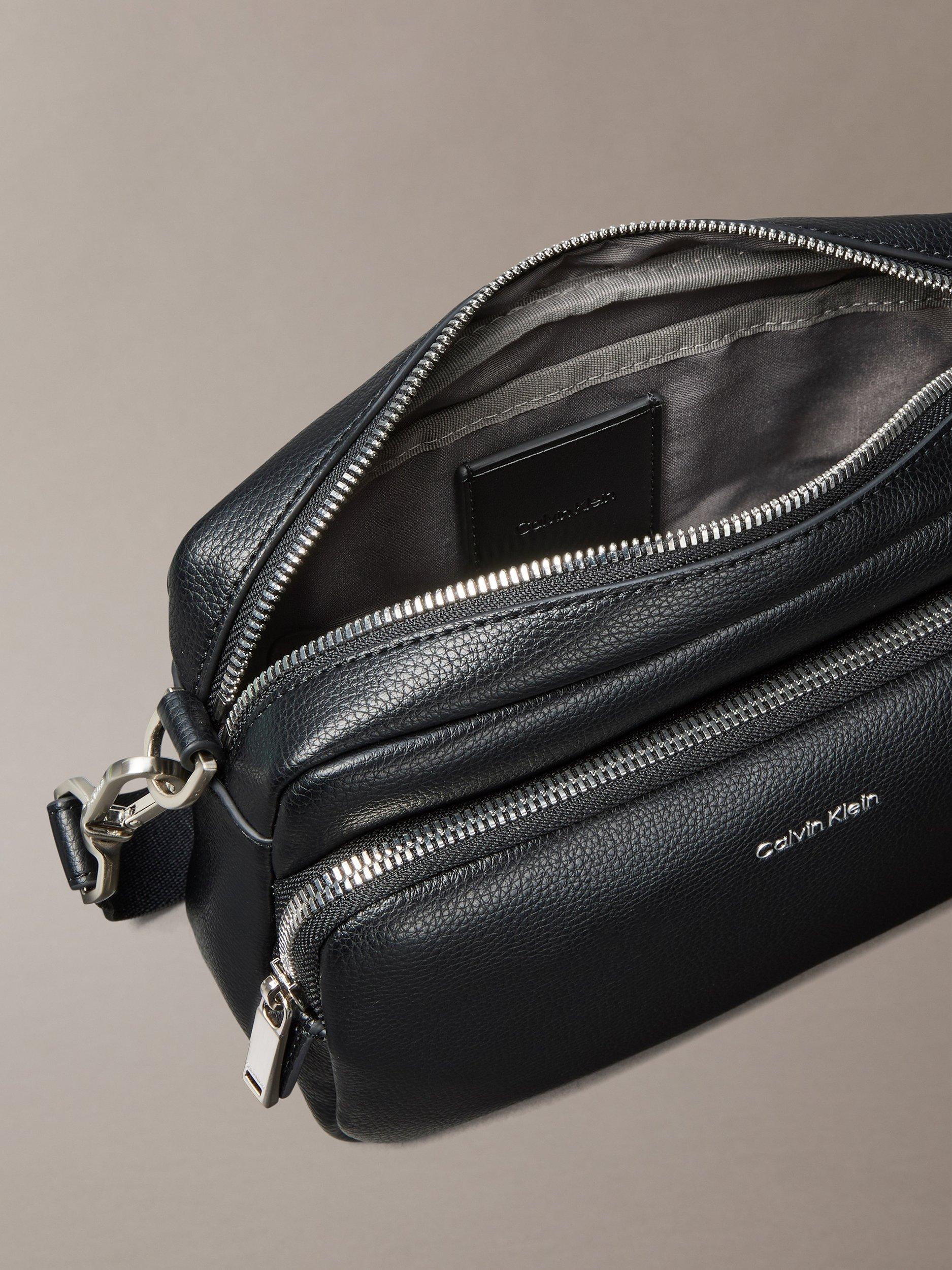 Calvin Klein black camera bag, imported from the UK