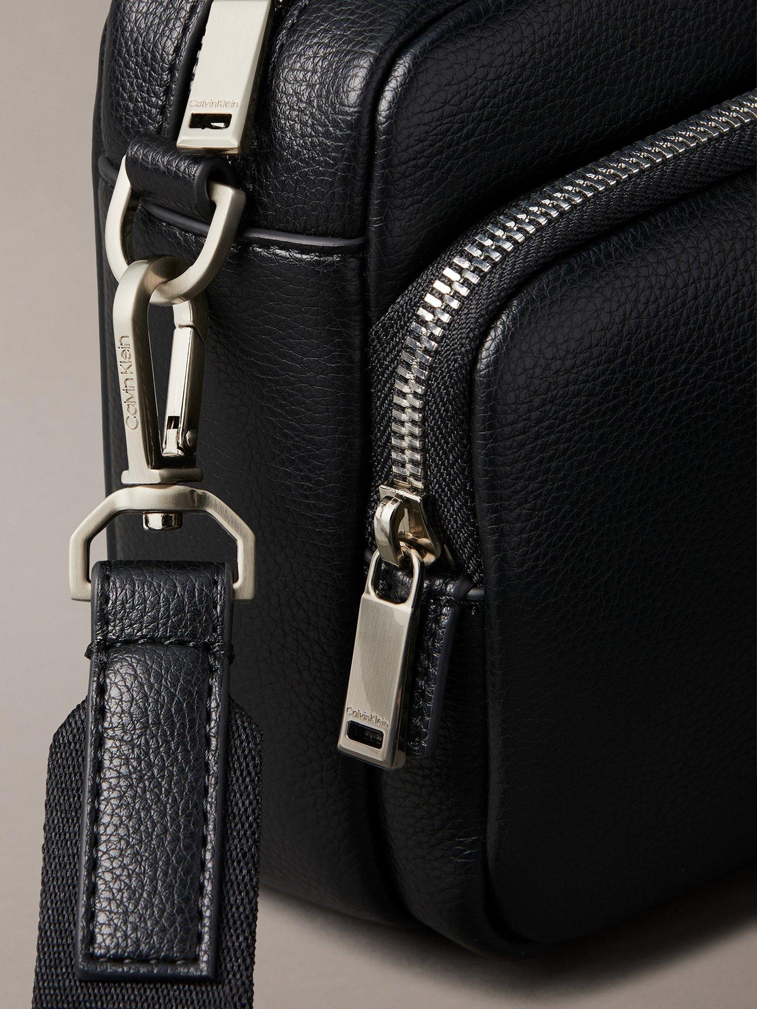 Calvin Klein black camera bag, imported from the UK