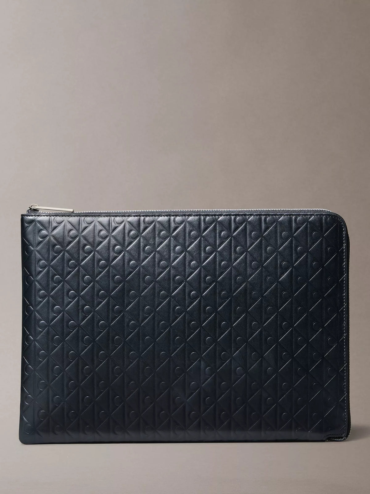 Calvin Klein leather embossed monogram pouch in black, imported from the UK