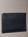Calvin Klein leather embossed monogram pouch in black, imported from the UK