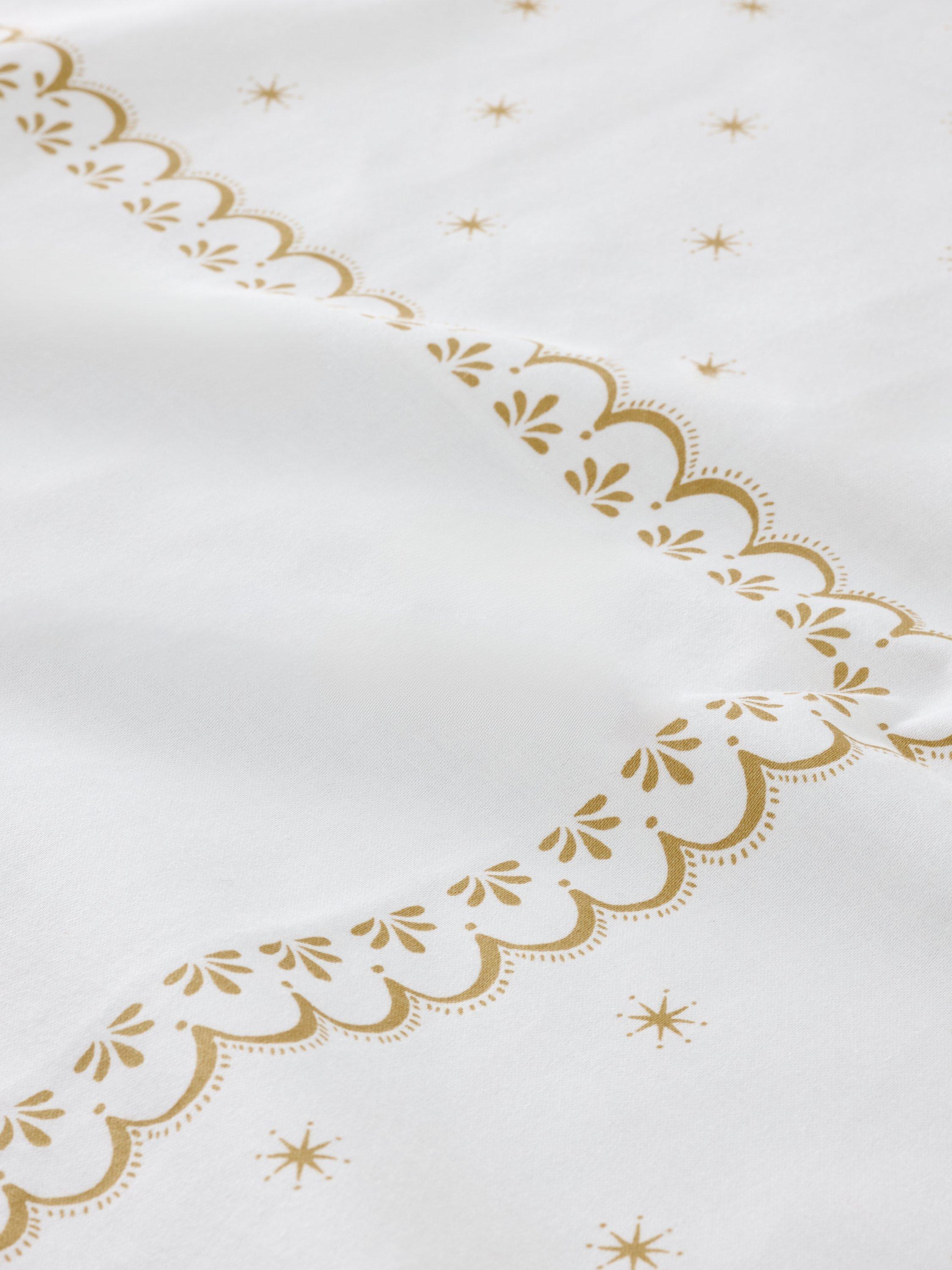 John Lewis scallop border gold tablecloth, UK version