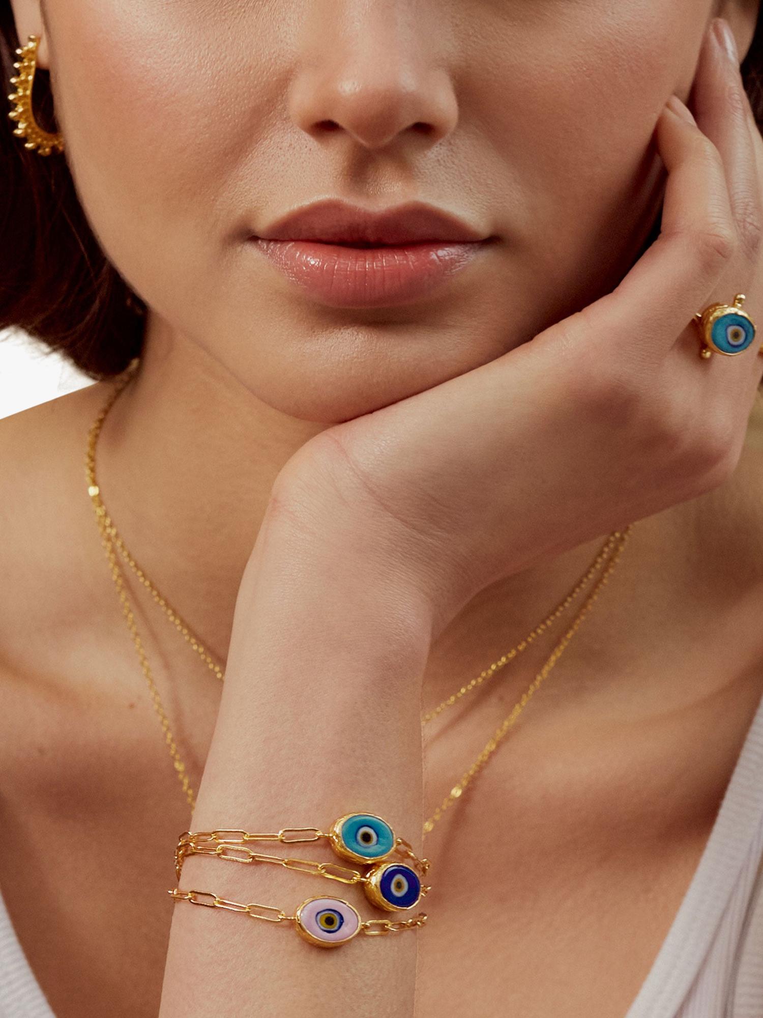 Ottoman Hands blue evil eye bracelet 21ct gold plated (British brand)