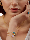 Ottoman Hands blue evil eye bracelet 21ct gold plated (British brand)