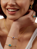 Ottoman Hands blue evil eye bracelet 21ct gold plated (British brand)