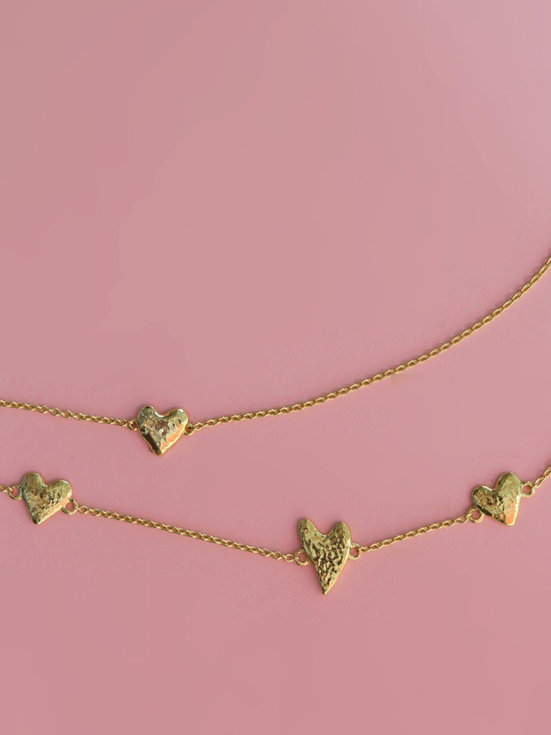 Ottoman Hands triple heart gold bracelet (British brand)