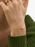 Ottoman Hands gold heart charm bracelet (British brand)