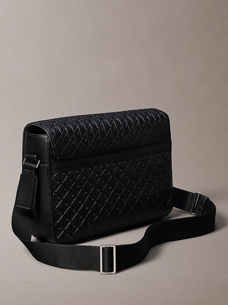 Calvin Klein messenger bag embossed emblem black (British brand)