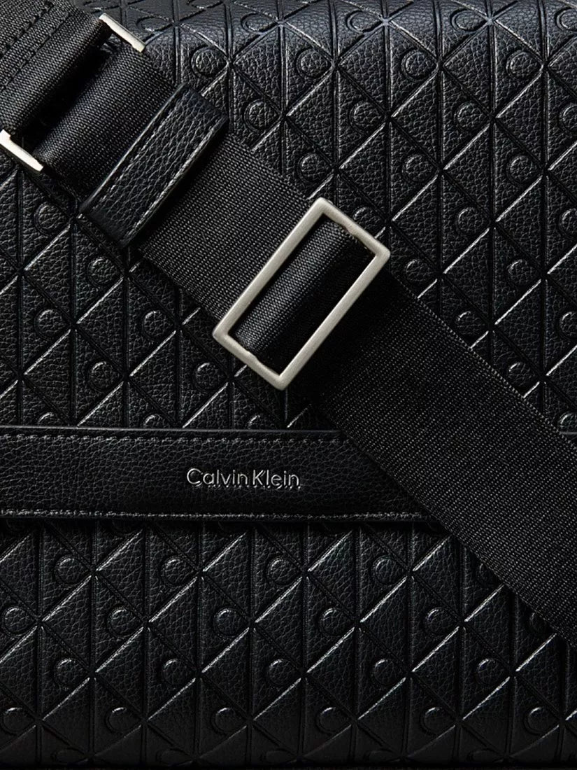 Calvin Klein messenger bag embossed emblem black (British brand)
