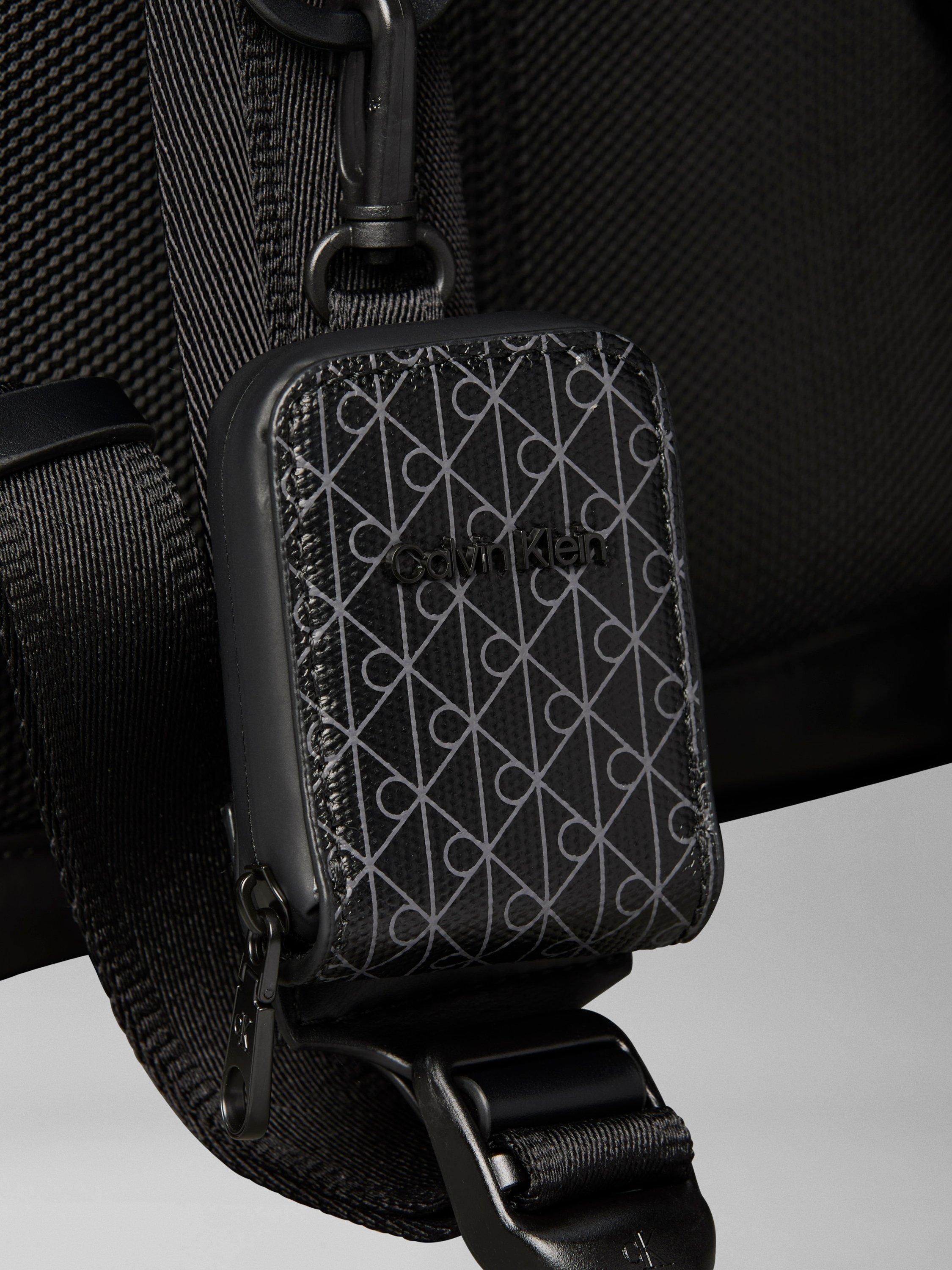 Calvin Klein Puffer Utility Roll Top Backpack Black, imported from the UK