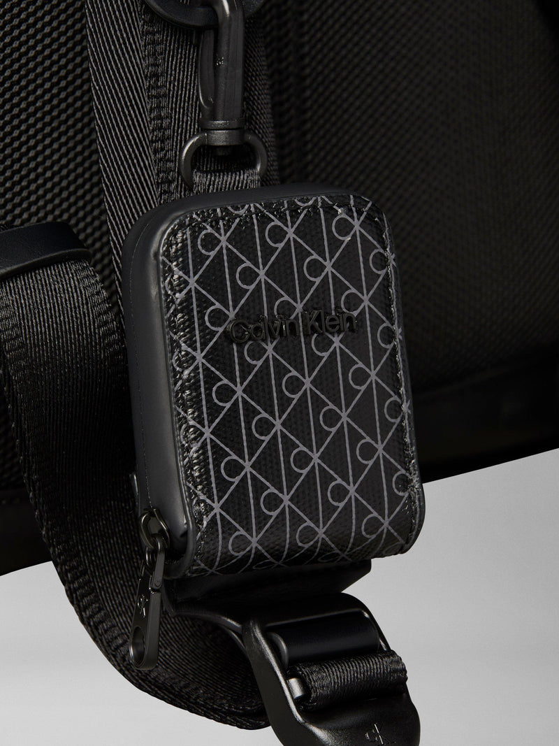 Calvin Klein Puffer Utility Roll Top Backpack Black, imported from the UK