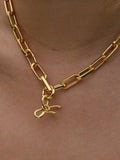 frkl. bow stack necklace in gold (British brand)