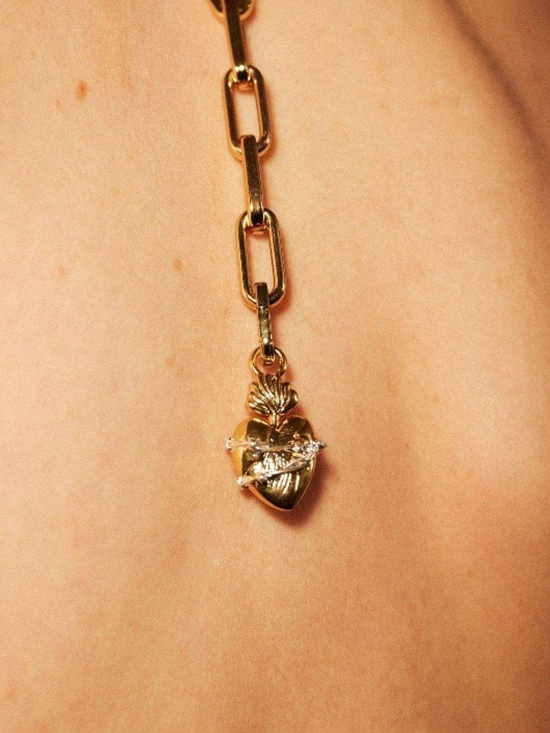 frkl. Love Is Pain gold charm imported from the UK