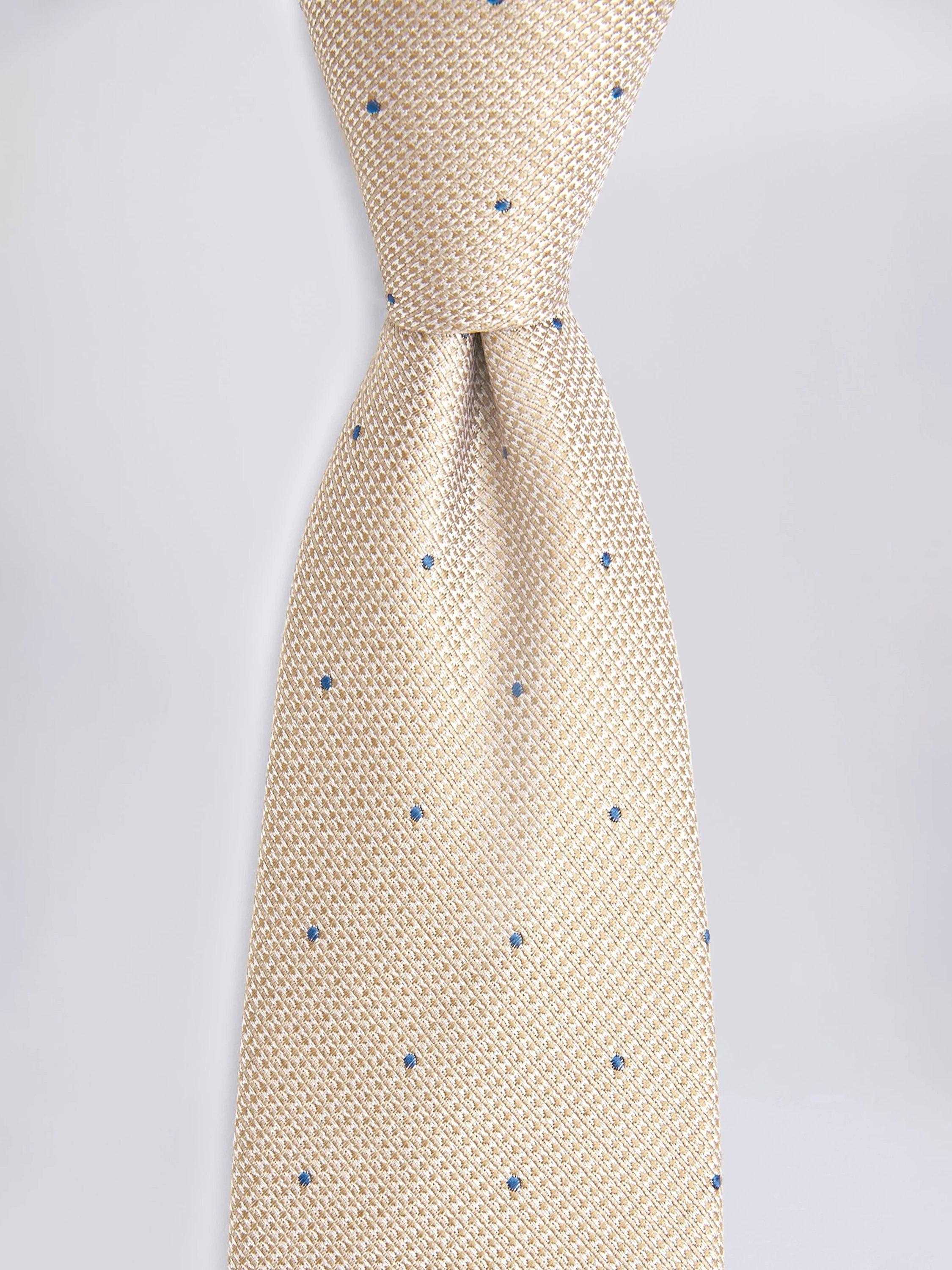 Moss champagne silk tie with blue spots, imported from the UK