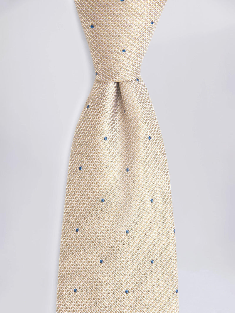 Moss champagne silk tie with blue spots, imported from the UK