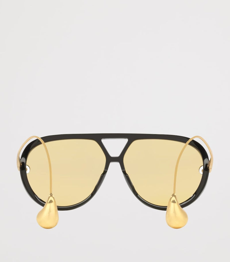 Bottega Veneta aviator sunglasses with drop-shaped temple tips, imported from the UK