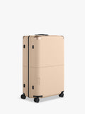 July Checked Plus large hard-sided suitcase 77cm, UK version