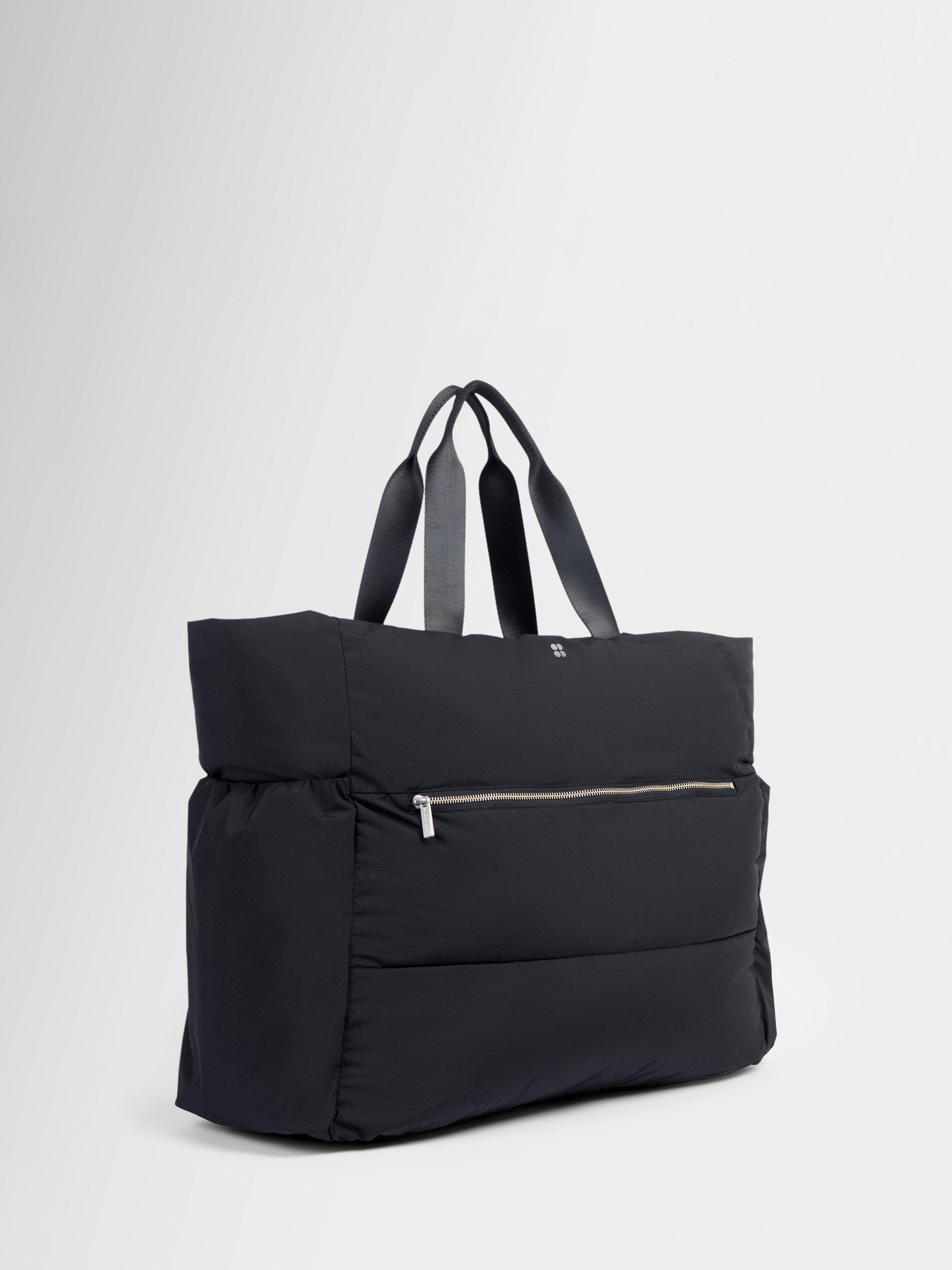 Sweaty Betty Nimbus water resistant grab bag black 47L (British brand)
