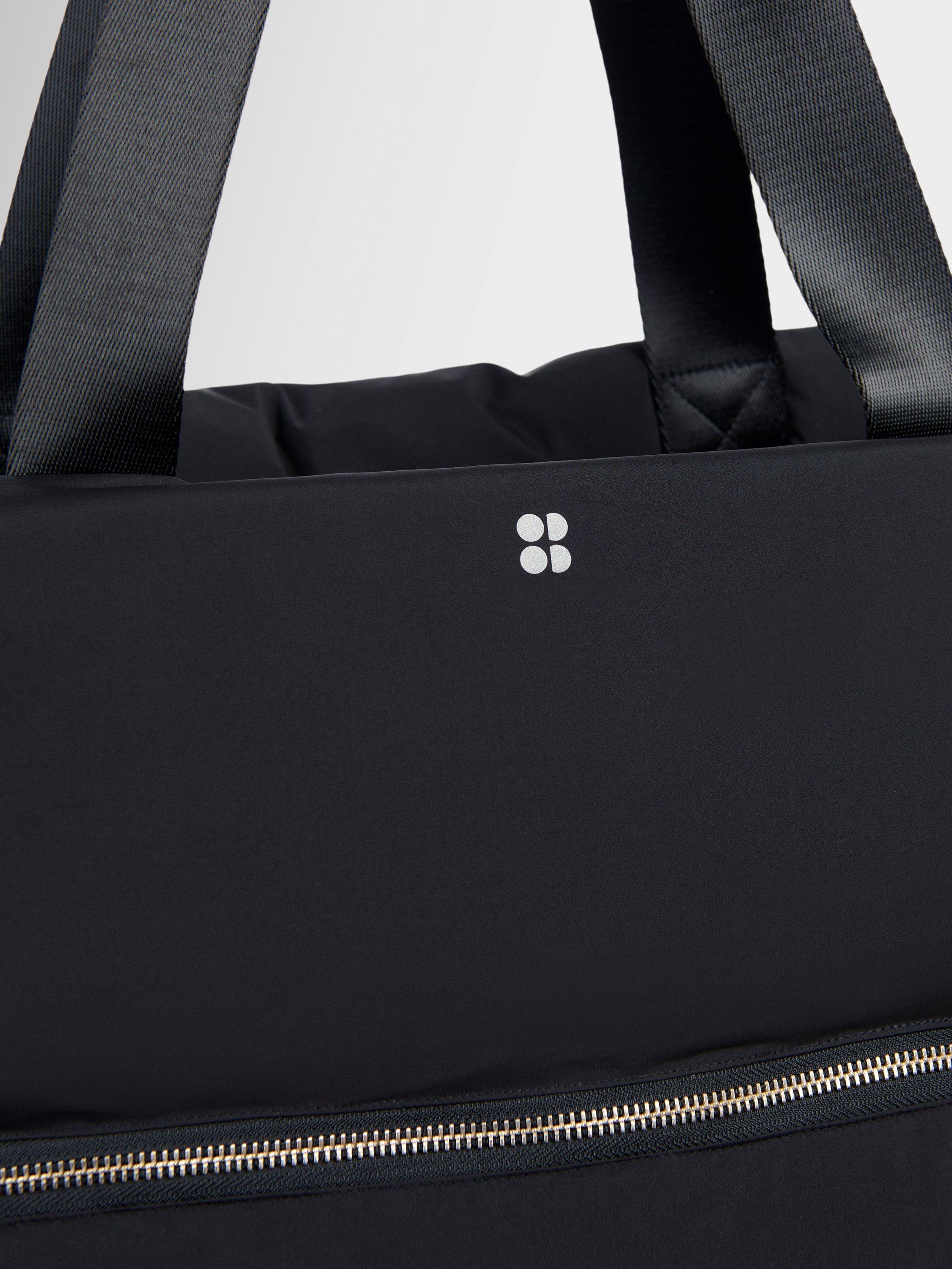 Sweaty Betty Nimbus water resistant grab bag black 47L (British brand)