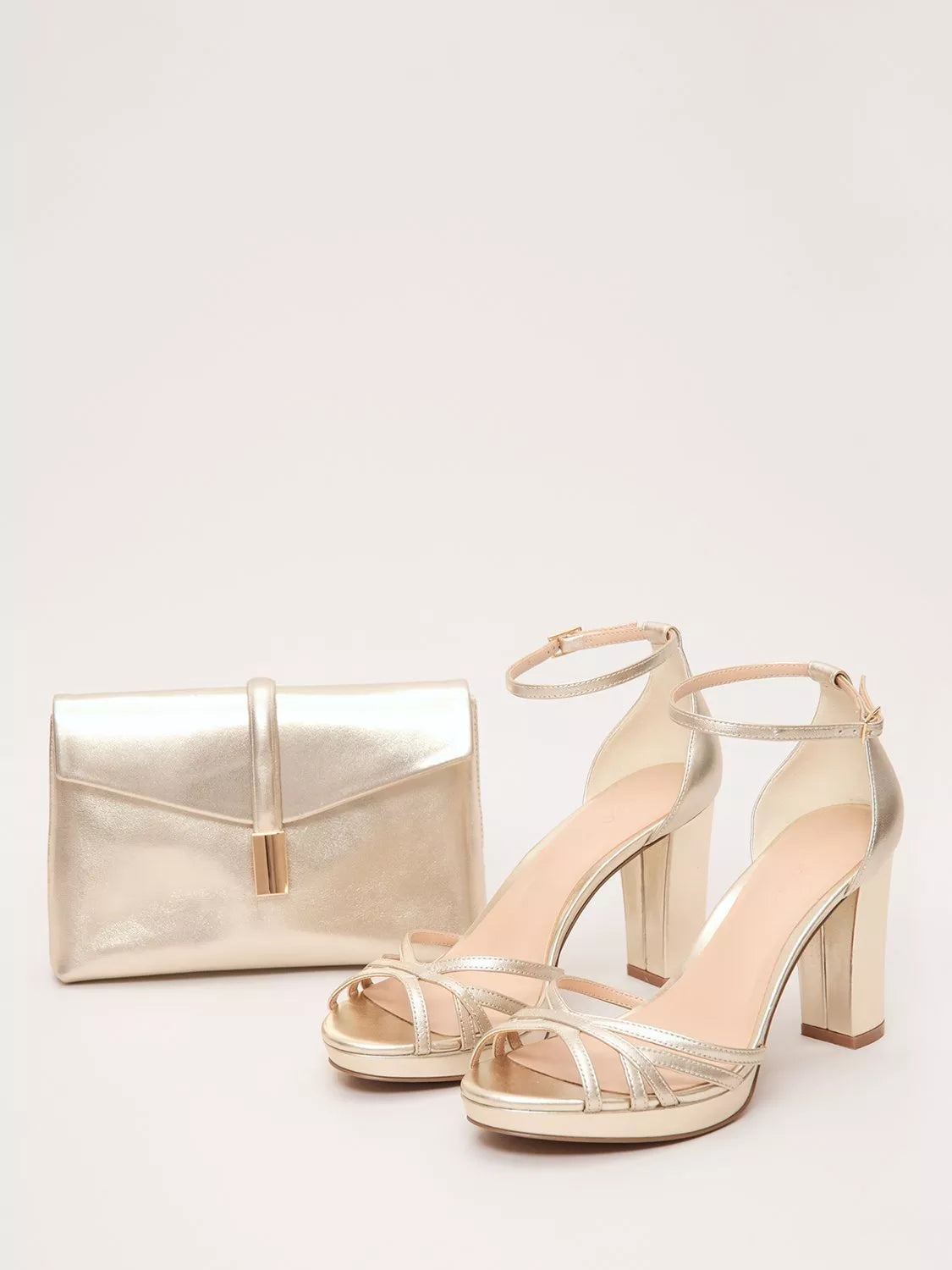 Phase Eight gold leather clutch bag, imported from the UK