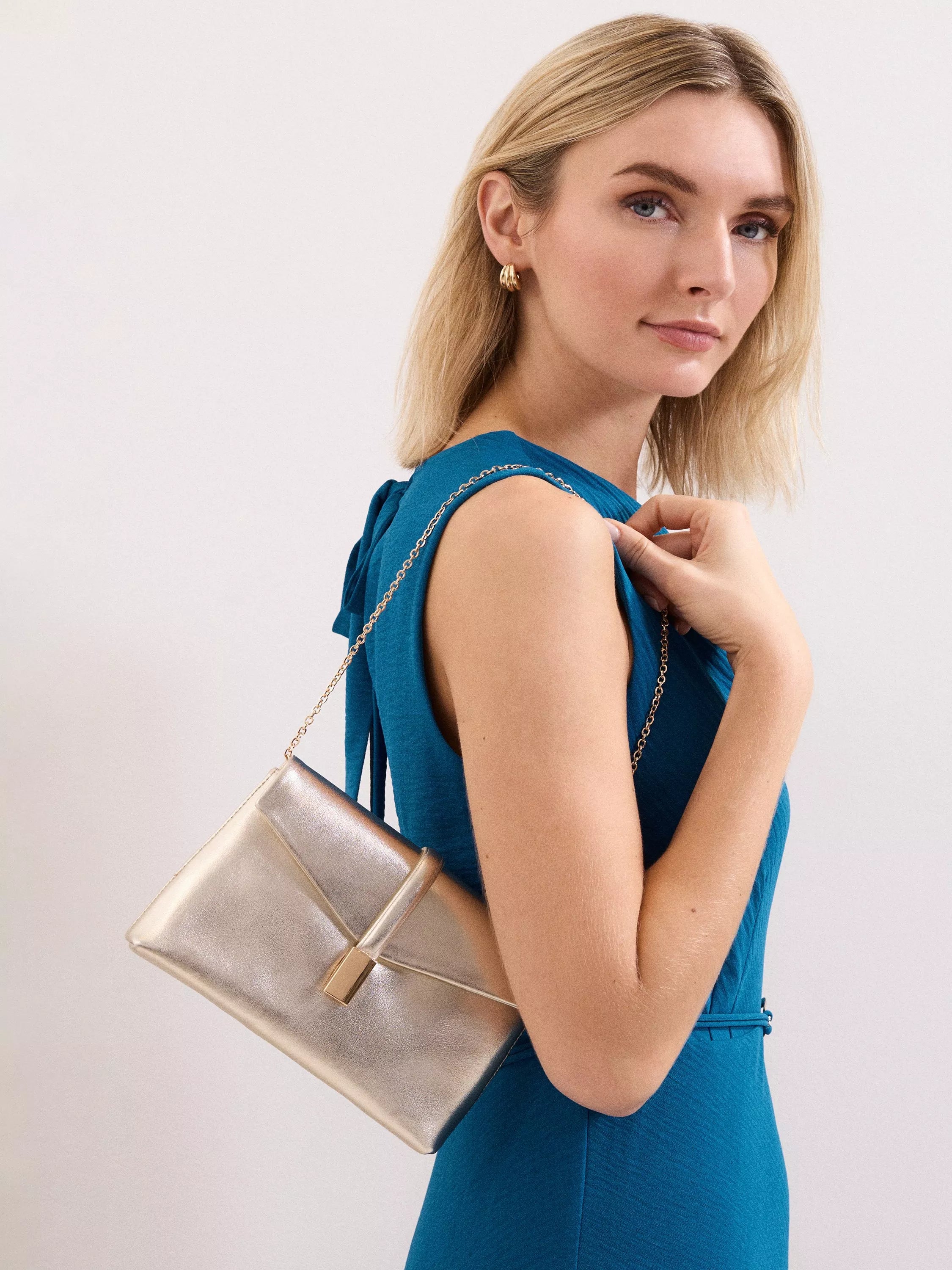 Phase Eight gold leather clutch bag, imported from the UK