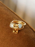 Daisy London aquamarine birthstone ring in gold, imported from the UK