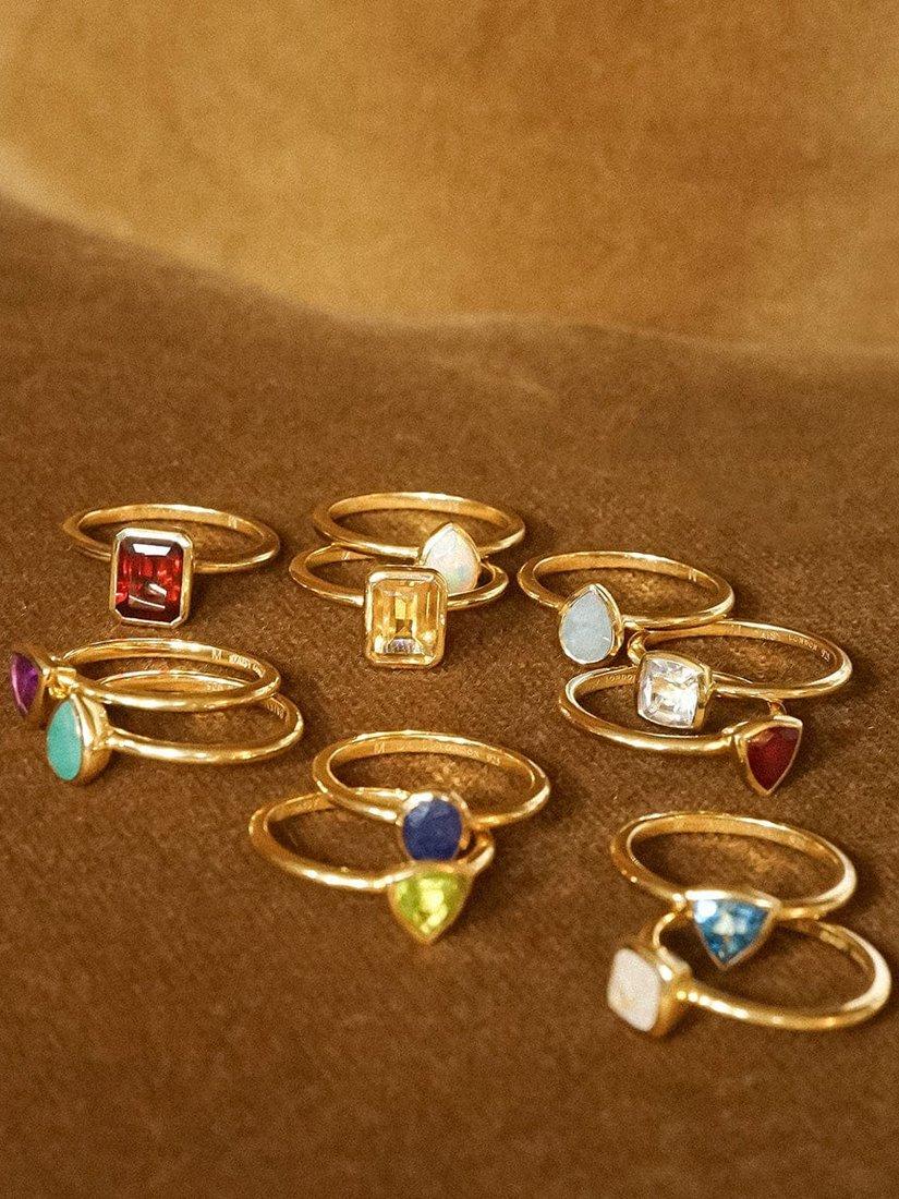 Daisy London Blue Topaz ring with gold plated 925 silver (British brand)