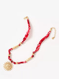 Mint Velvet sun charm necklace in red (British brand)