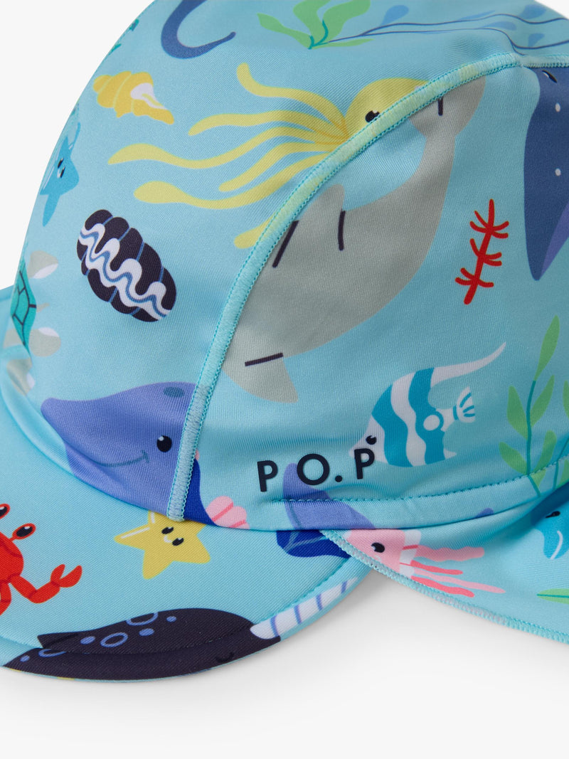 Polarn O. Pyret kids swim hat in blue with sea life print, imported from the UK