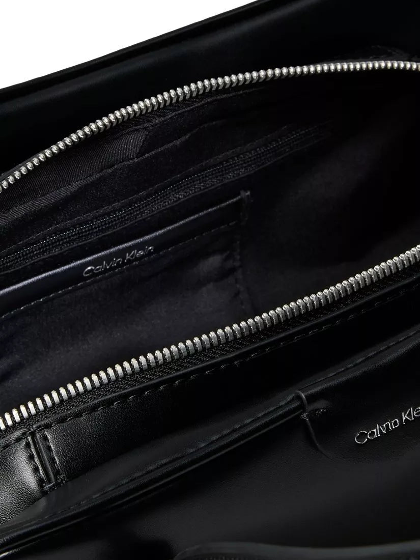 Calvin Klein Emblem shoulder bag in black, UK version