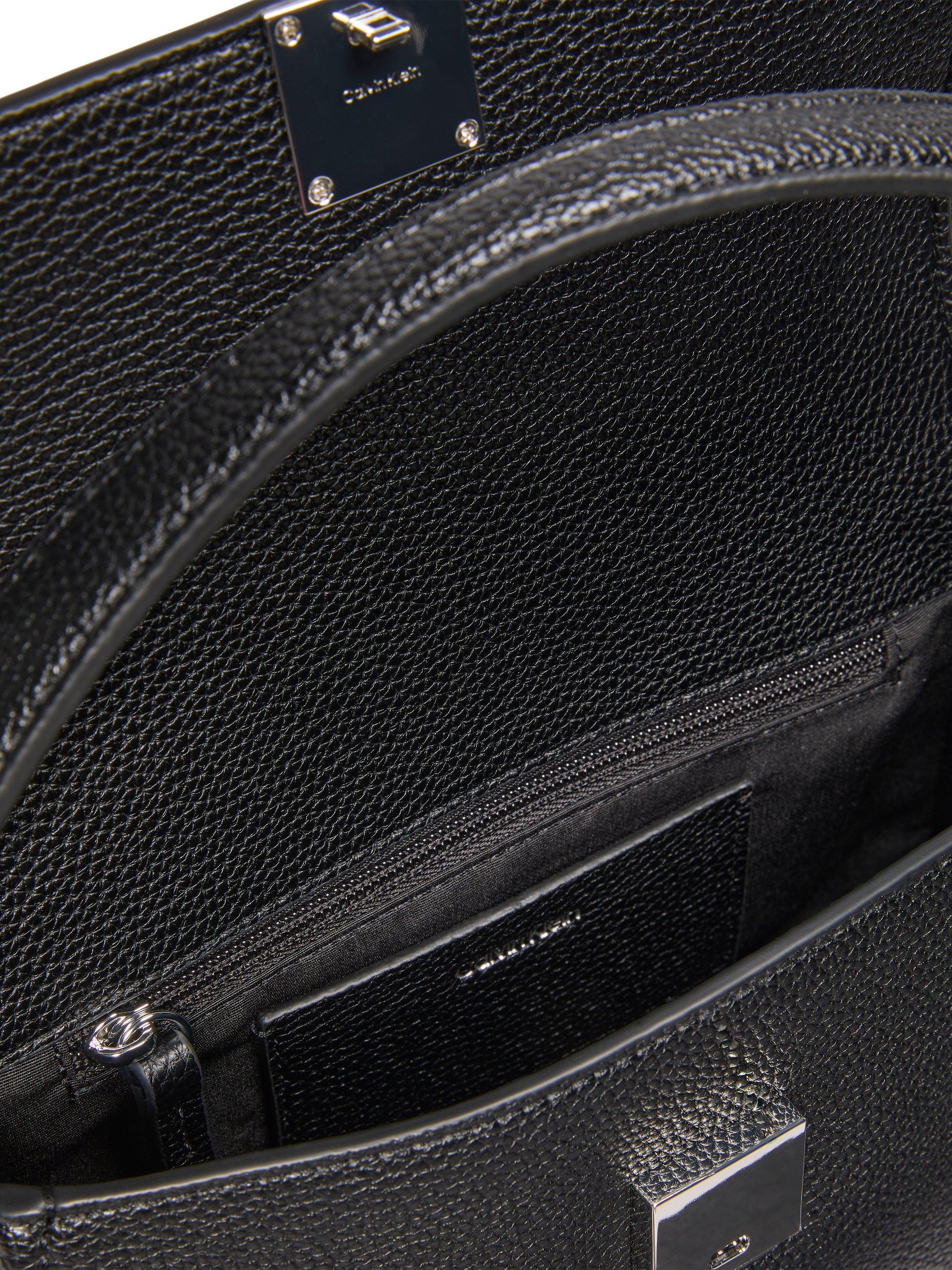 Calvin Klein Emblem grab bag black faux leather (British brand)