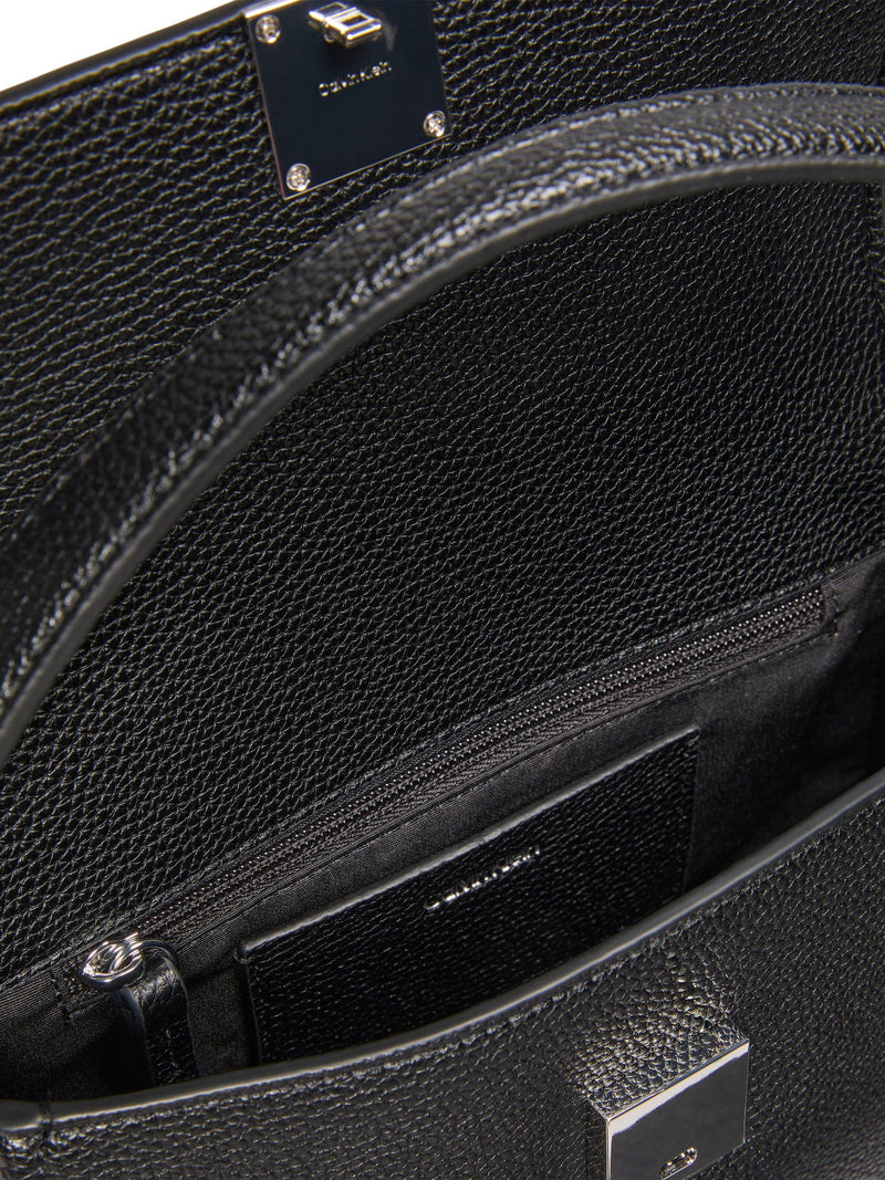 Calvin Klein Emblem grab bag black faux leather (British brand)