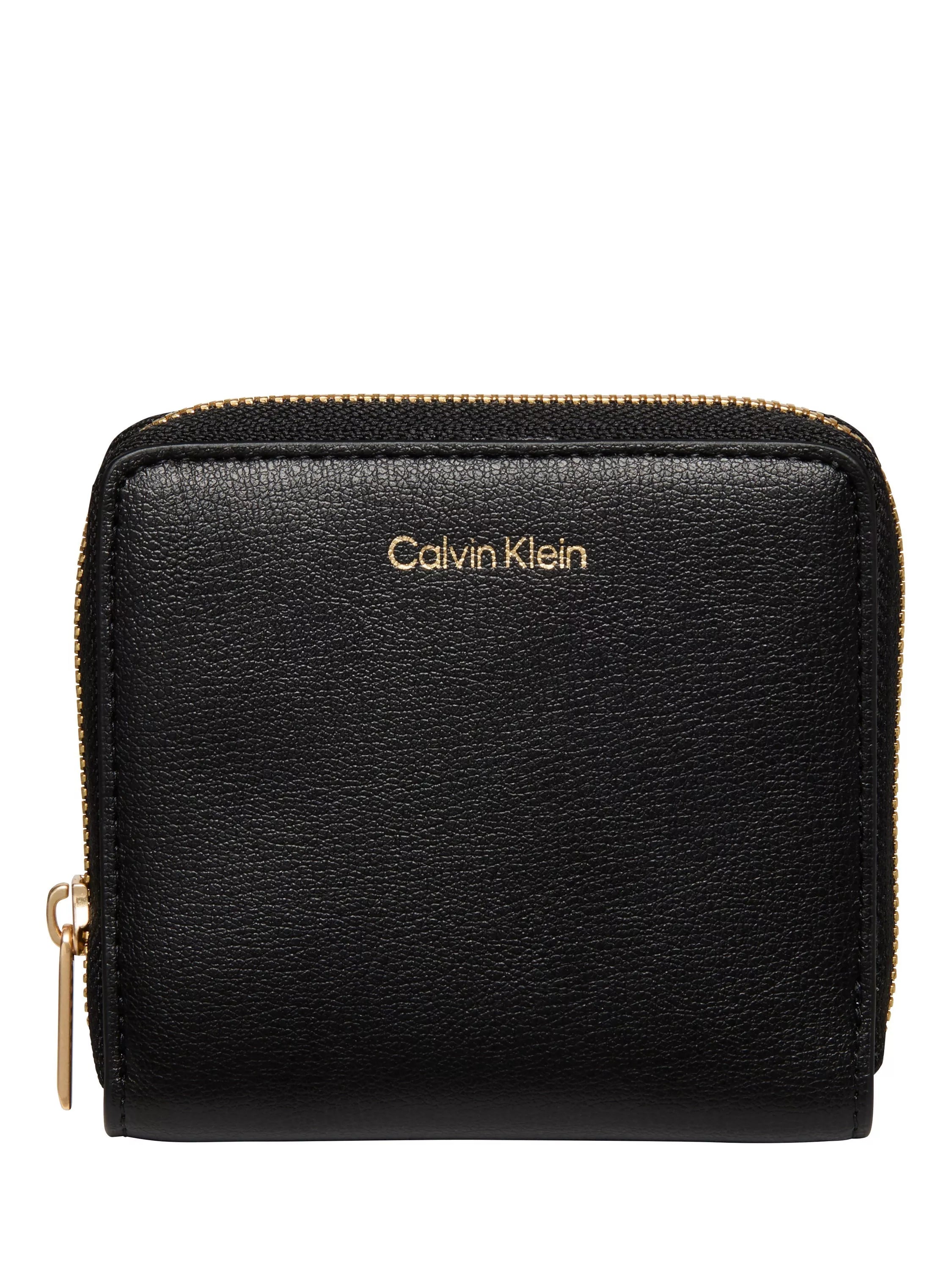 Calvin Klein black zip around wallet in saffiano faux leather, imported from the UK