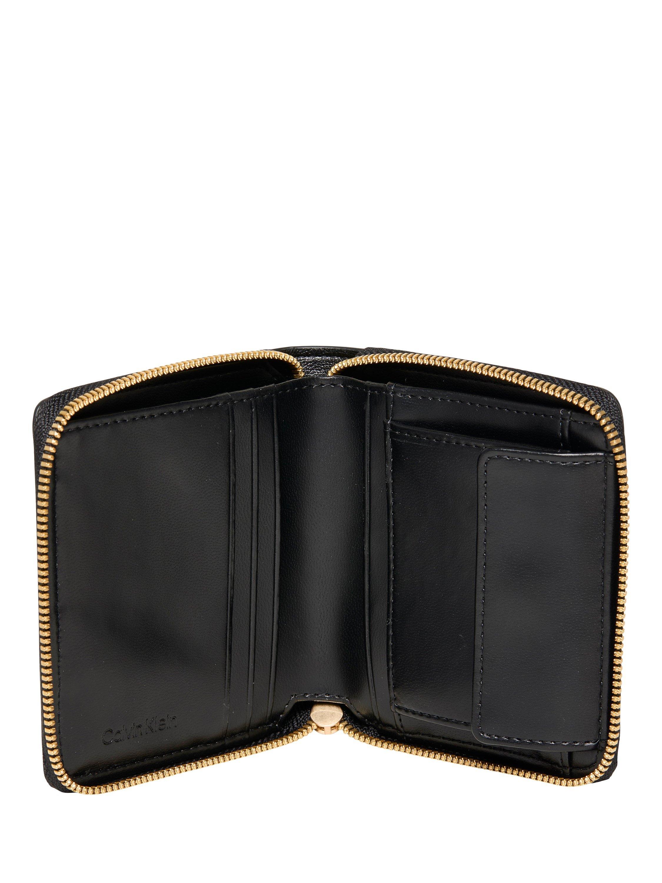 Calvin Klein black zip around wallet in saffiano faux leather, imported from the UK