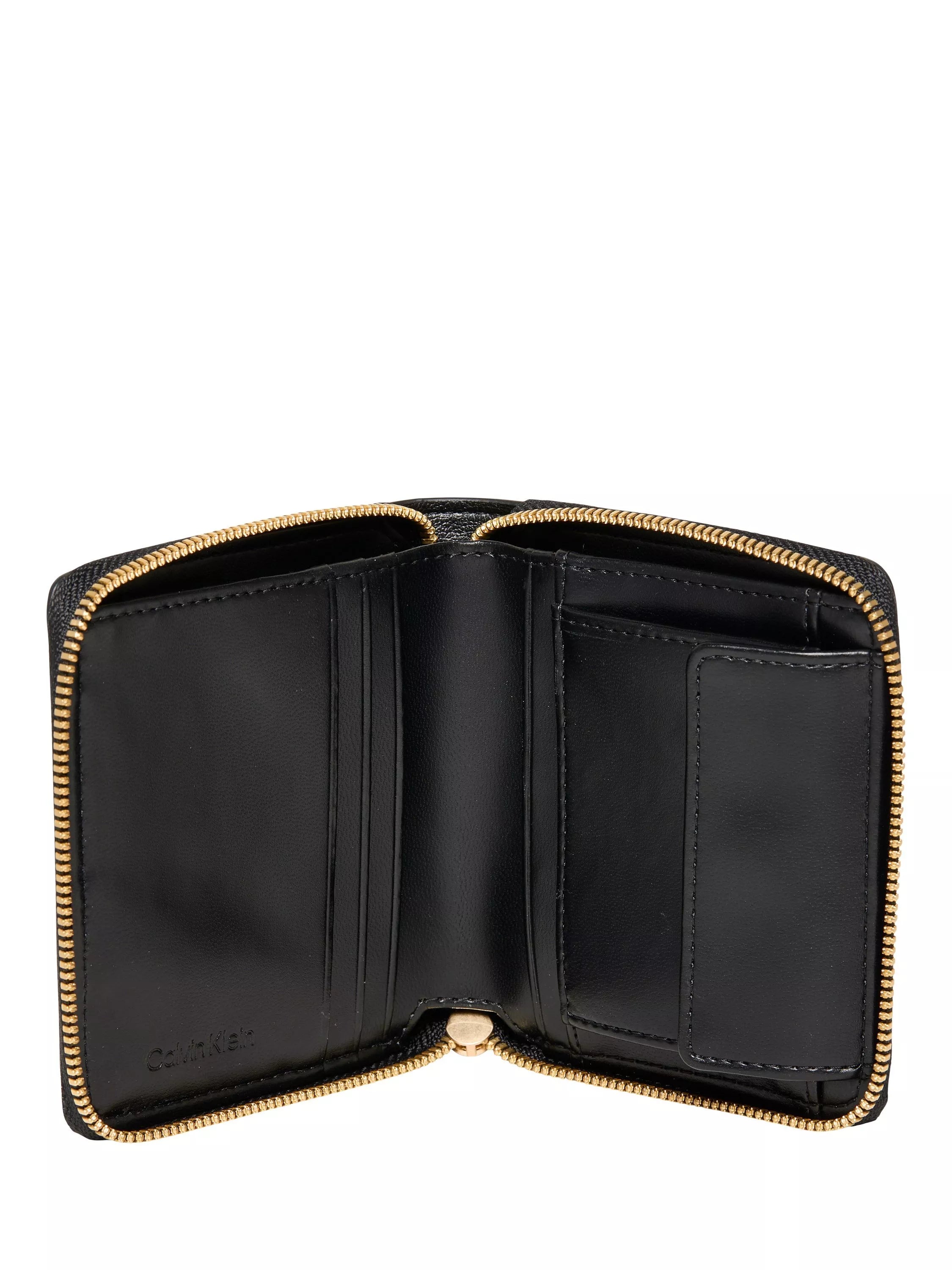 Calvin Klein black zip around wallet in saffiano faux leather, imported from the UK