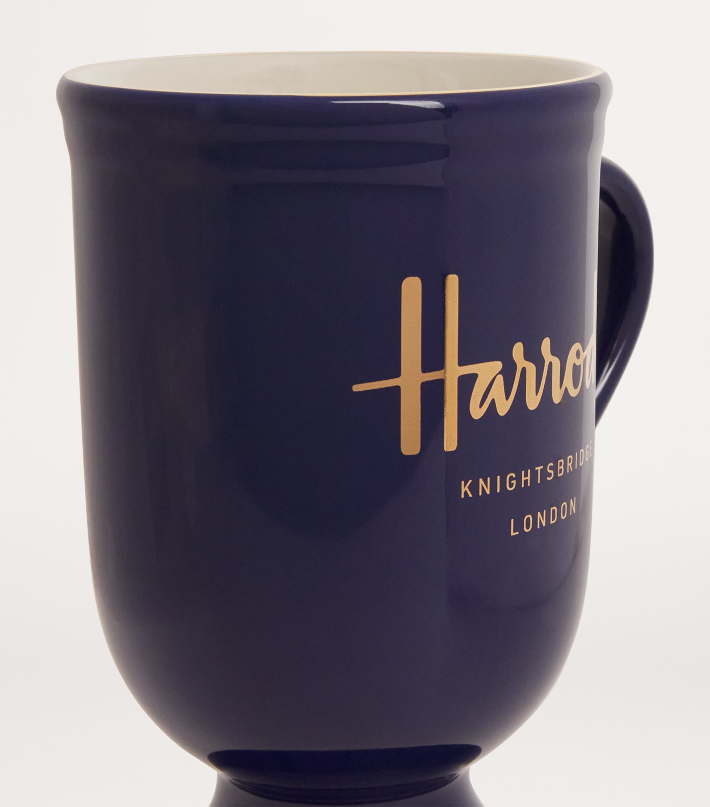 Harrods pedestal mug with gold trim and vibrant color, 284ml capacity, UK version